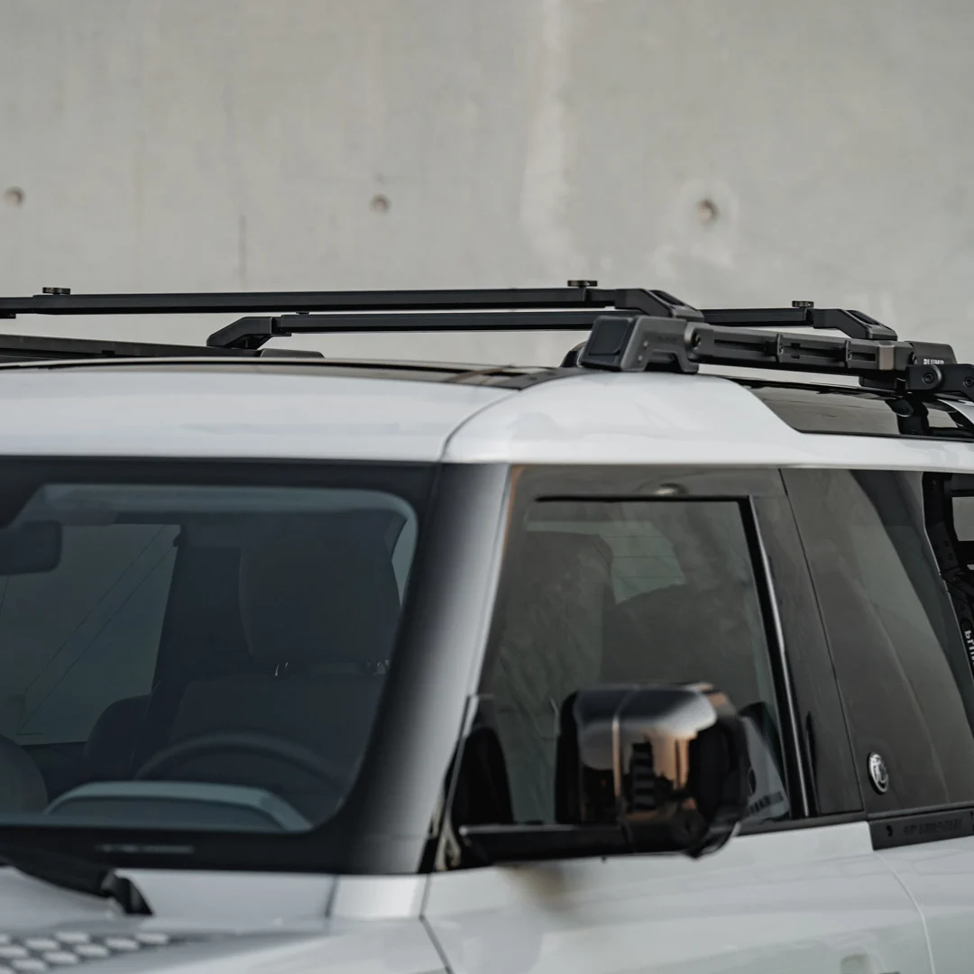 PLUMB Side Ladder Land Rover Defender 90 installed on rear roof rack